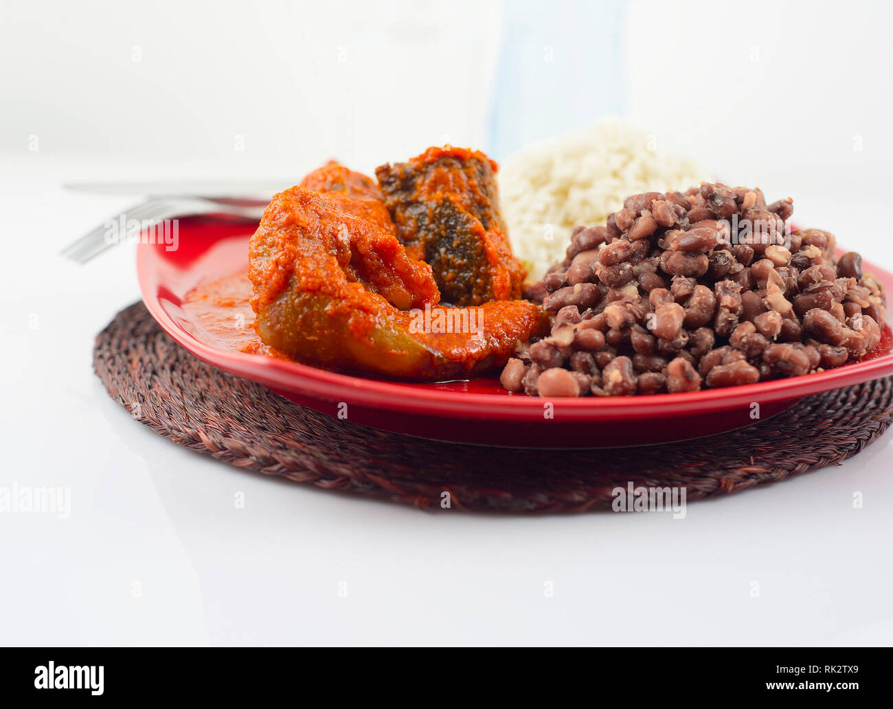 Popular Nigerian Meals Beans and white rice served with assorted meat
