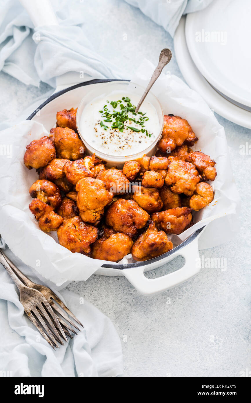 Baked Cauliflower Wings with Sauce Stock Photo Alamy