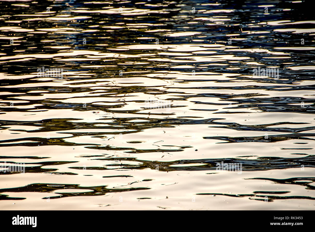 Water of the sea with sun reflections Stock Photo - Alamy