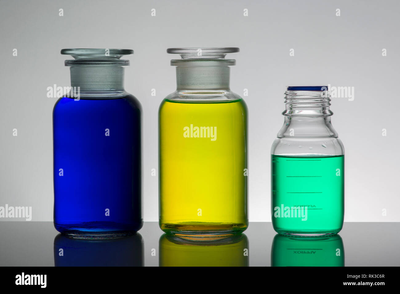 Liquid in laboratory bottles. Scientific biochemical laboratory