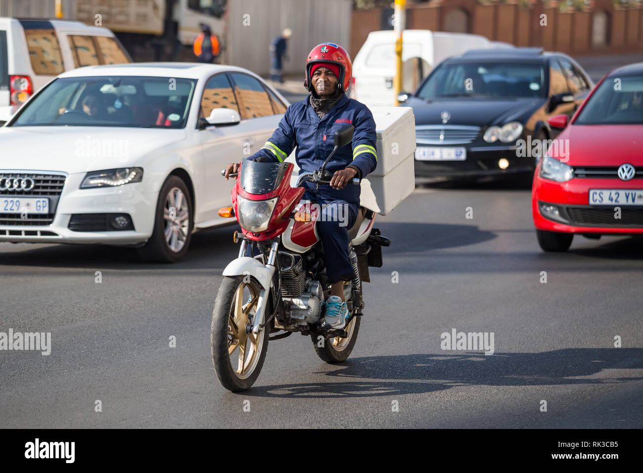 Johannesburg, South Africa, 24 August 2018 Delivery courier on