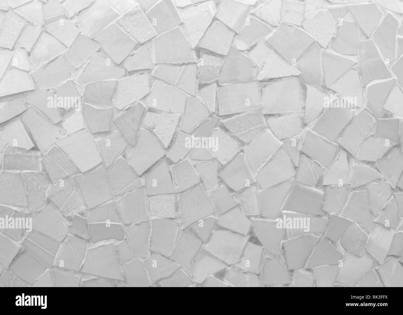 Broken tiles mosaic seamless pattern. White and Grey the tile wall high resolution real photo or brick seamless and texture interior background. Stock Photo