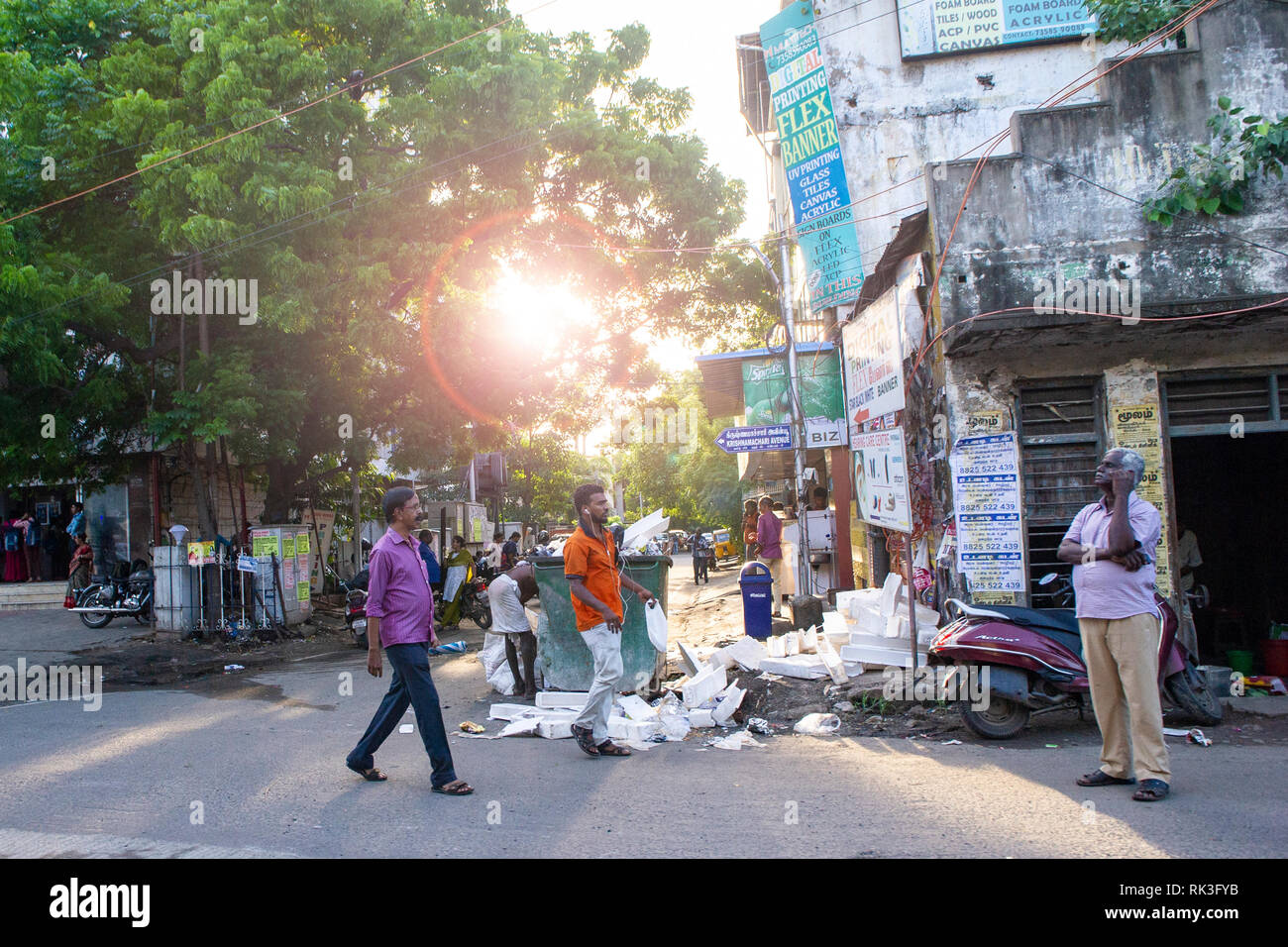 Chilling out on a street corner in Chennai, India Stock Photo
