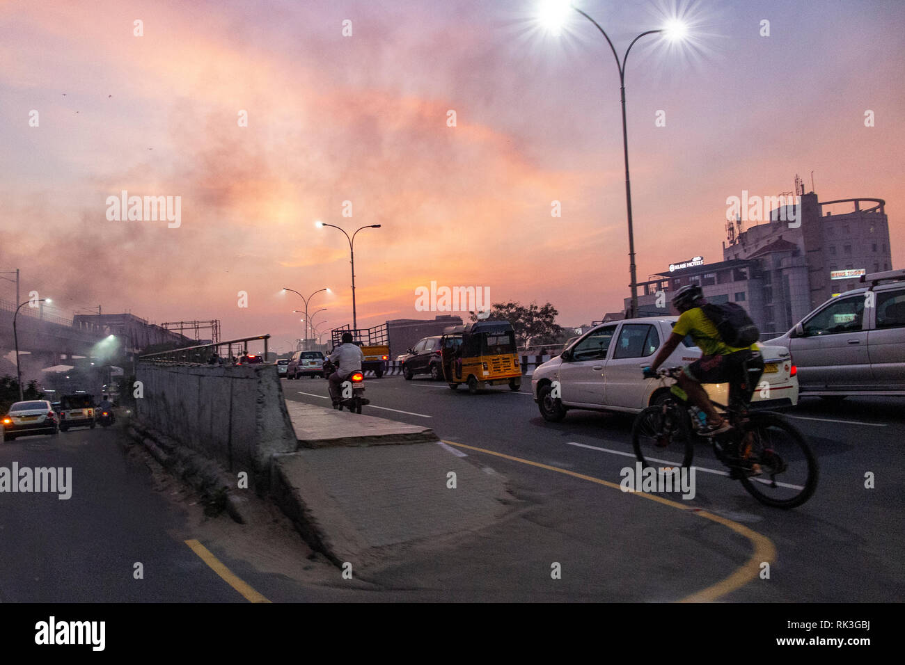 Rush hour as the sun sets in Chenna, India Stock Photo