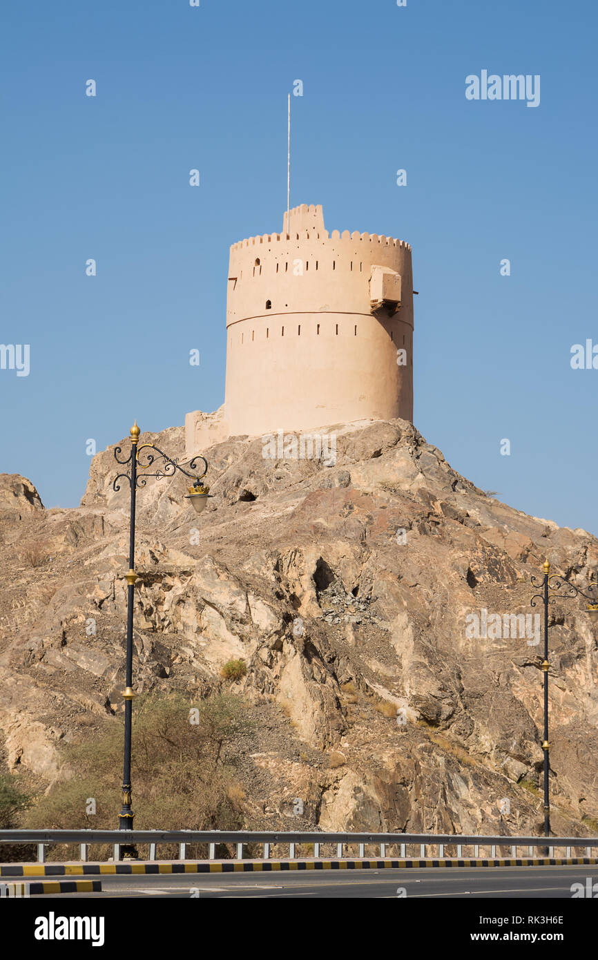 Ancient tower on top of a rocky hill in Oman Stock Photo