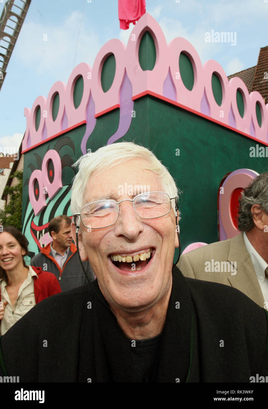 Plochingen, Germany. 15th Sep, 2007. Artist and caricaturist Tomi Ungerer laughs in front of the art-toilet designed by himself in Plochingen, Germany, 15 September 2007. The first design of the toilet last year was controversial, the toilet was opened on 15 September. Credit: Bernd Weißbrod | usage worldwide/dpa/Alamy Live News Stock Photo