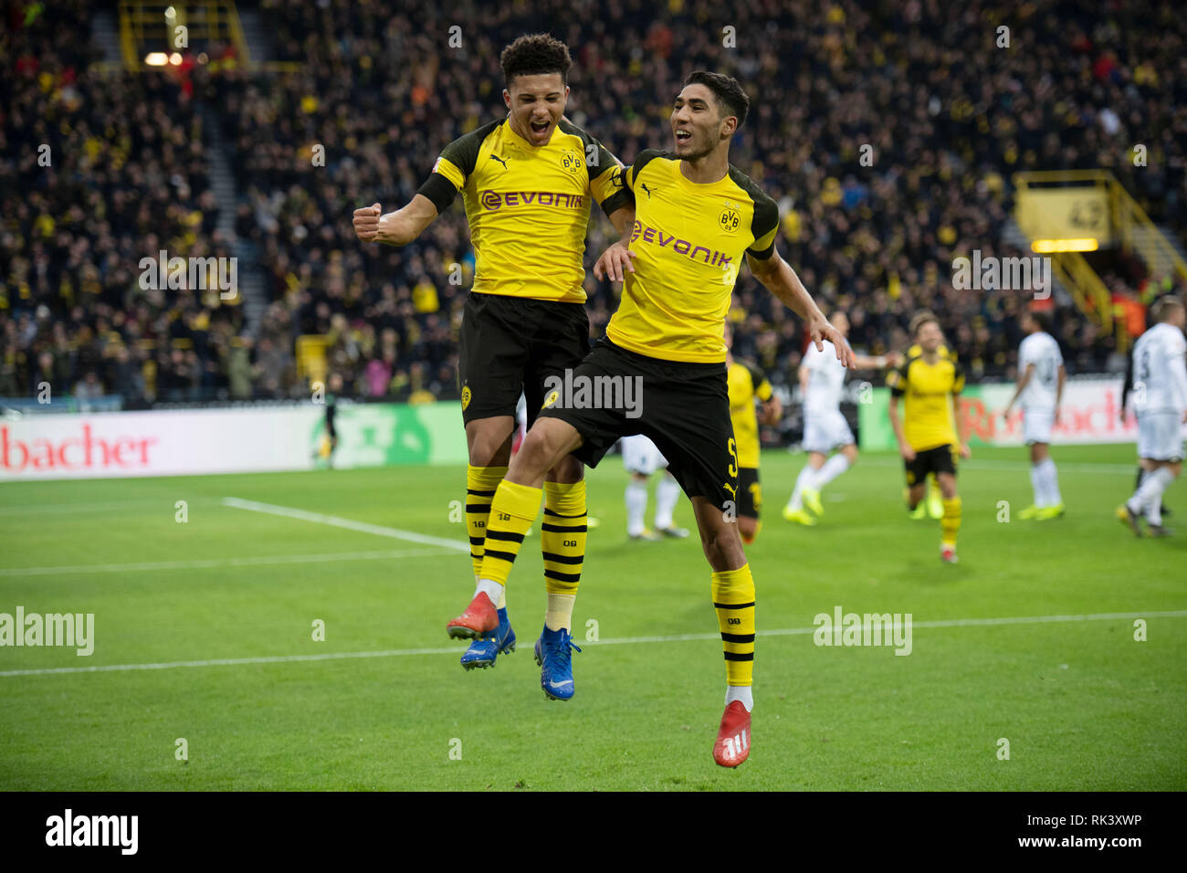 Dortmund, Germany. 09th Feb, 2019. Soccer: Bundesliga, Borussia Dortmund - 1899 Hoffenheim, 21st matchday at Signal Iduna Park: Dortmund's Jadon Sancho (l) and Achraf Hakimi cheer for a goal that was not scored after video evidence. Credit: Bernd Thissen/dpa - IMPORTANT NOTE: In accordance with the requirements of the DFL Deutsche Fußball Liga or the DFB Deutscher Fußball-Bund, it is prohibited to use or have used photographs taken in the stadium and/or the match in the form of sequence images and/or video-like photo sequences./dpa/Alamy Live News Stock Photo