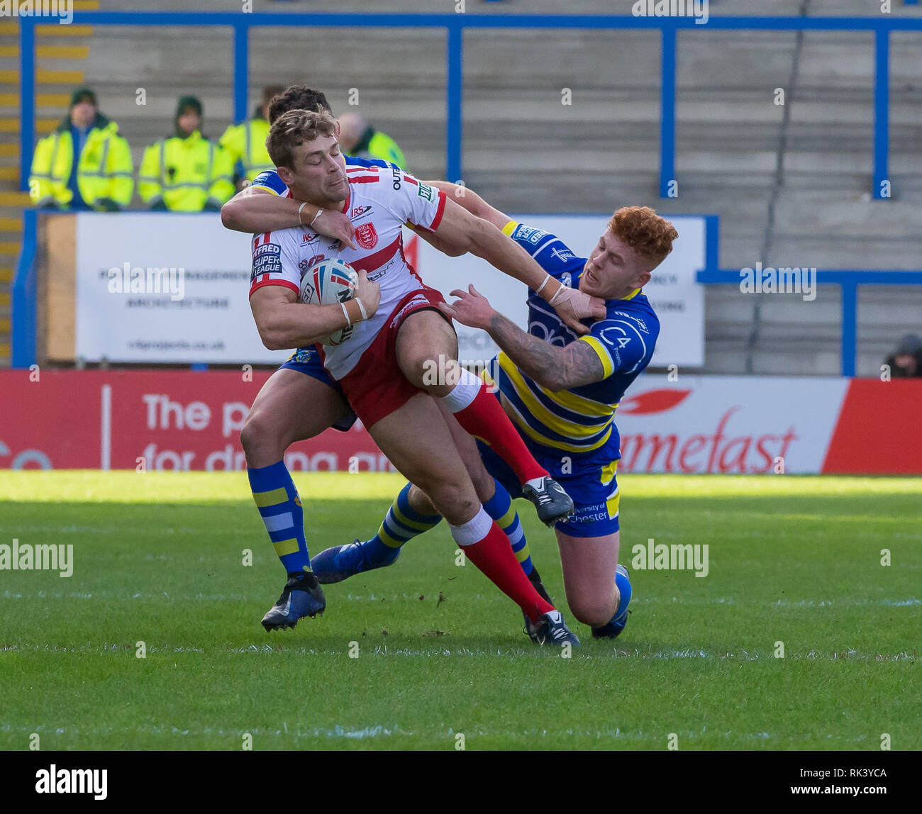 Halliwell Jones Stadium, Warrington, UK. 9th Feb, 2019. Betfred Super League rugby, Warrington Wolves versus Hull KR; Jimmy Keinhorst is tackled by Bryson Goodwin and Danny Walker Credit: Action Plus Sports/Alamy Live News Stock Photo