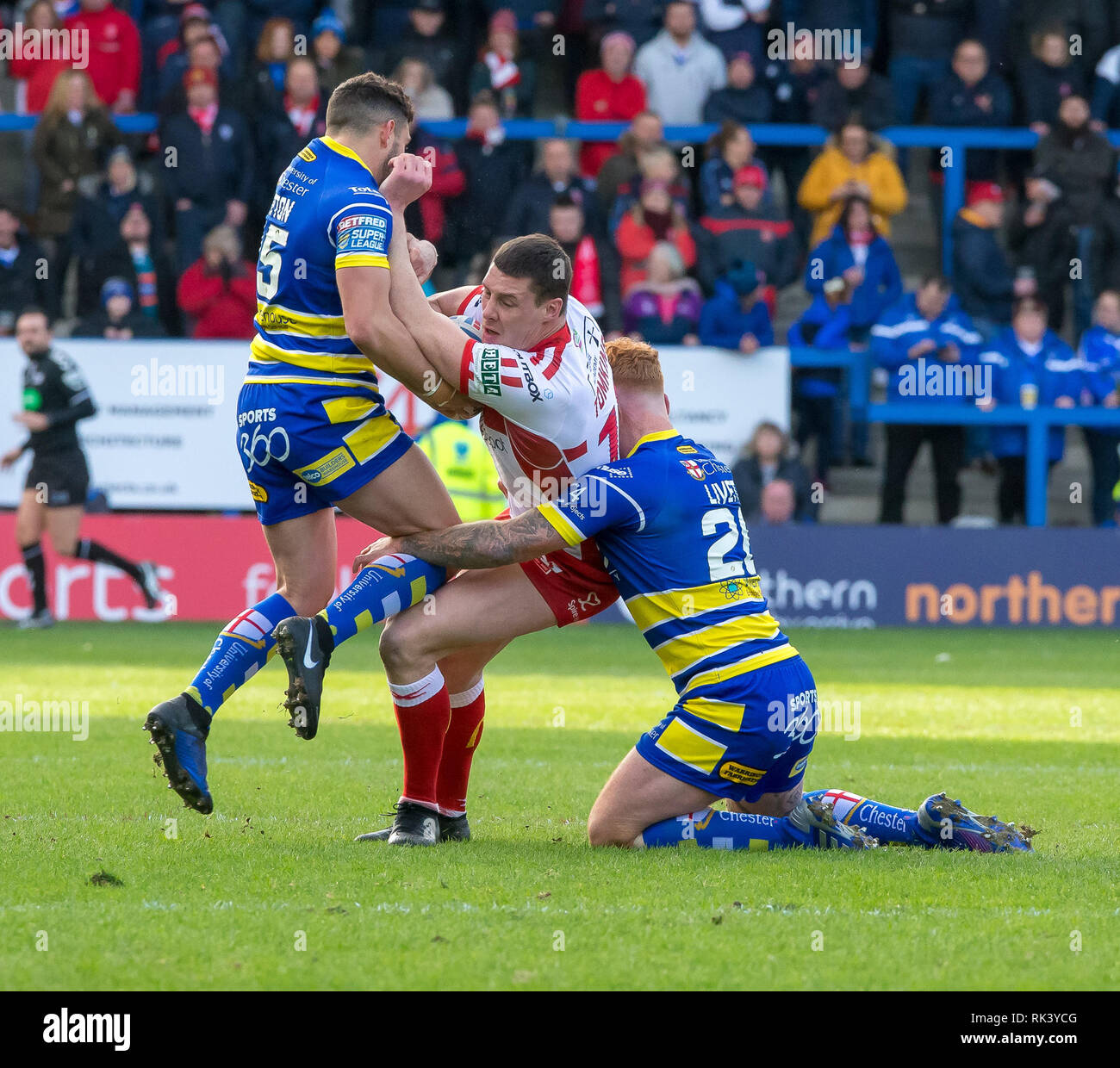 Halliwell Jones Stadium, Warrington, UK. 9th Feb, 2019. Betfred Super League rugby, Warrington Wolves versus Hull KR; Danny McGuire is tackled by Declan Patton and Danny Walker Credit: Action Plus Sports/Alamy Live News Stock Photo