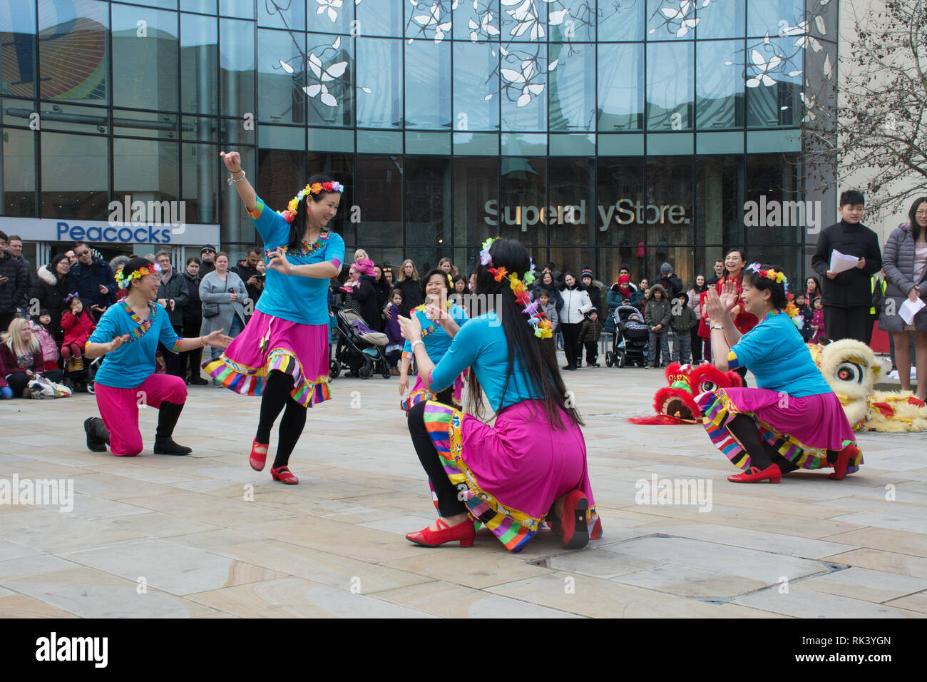 Woking, Surrey, UK. 9th February, 2019. Woking town centre celebrated the Chinese New Year of the Pig today with colourful parades and shows. A dance performance. Stock Photo