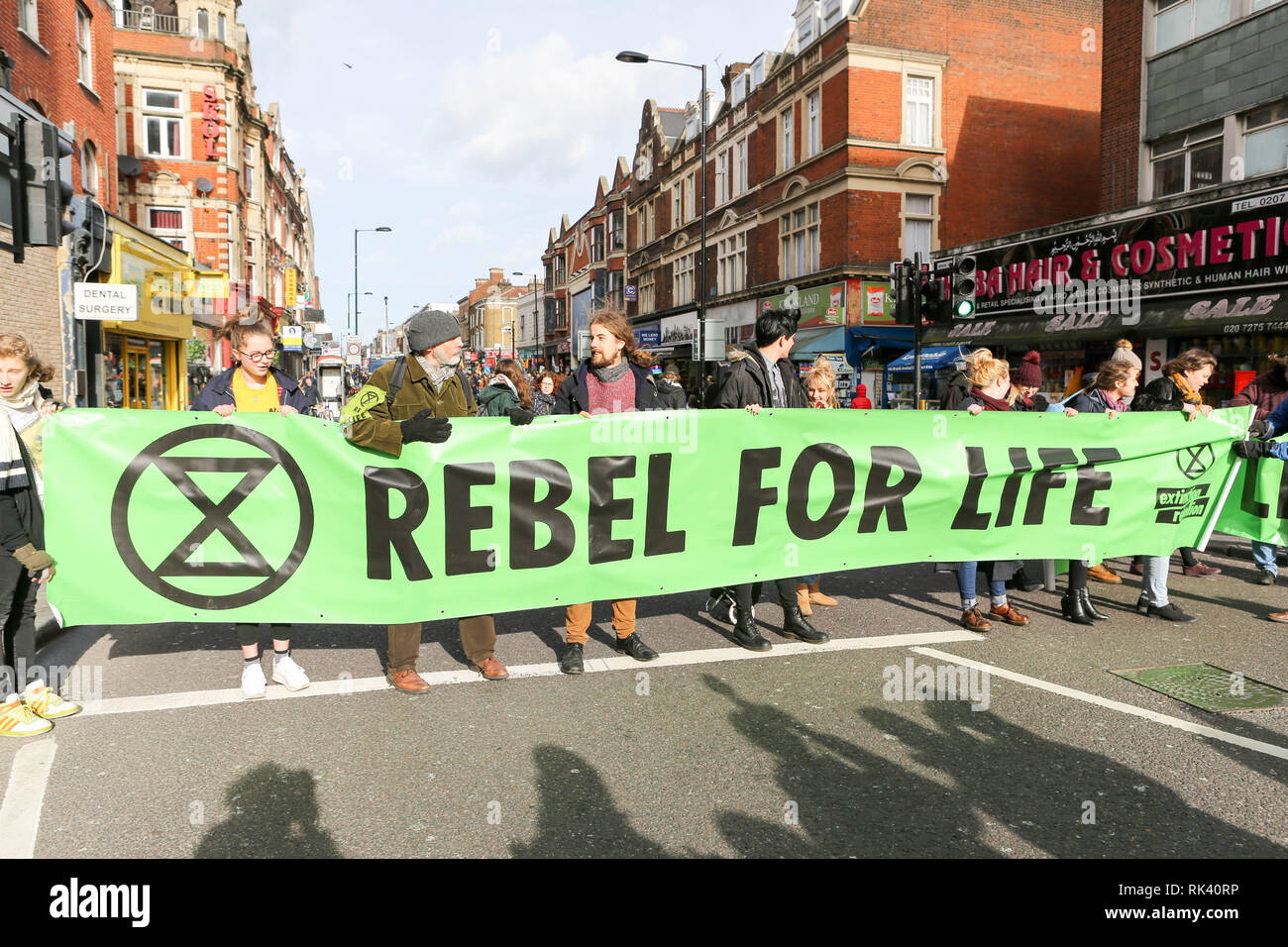 London, UK.. 9th Feb, 2019. Environmental protesters meet outside Dalston Kingsland railway station for a variety of street performances, engagement with the local community and number of short road blocks. Credit: Penelope Barritt/Alamy Live News Stock Photo