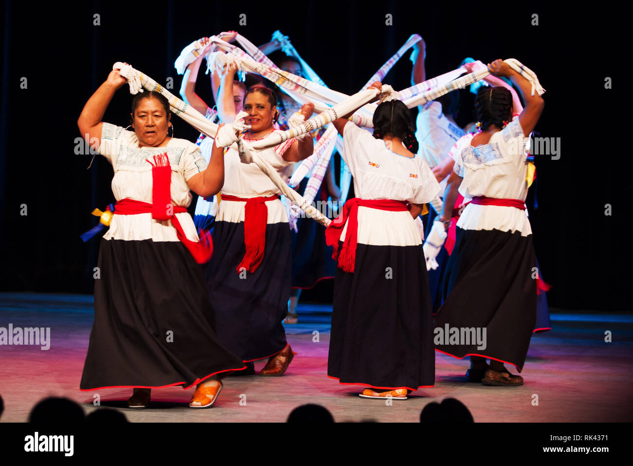 Tlaxcala, Mexico - February 08.2019 A group of mexican female dancers dancing a traditional mexican dance. Handmade mexican dresses Stock Photo