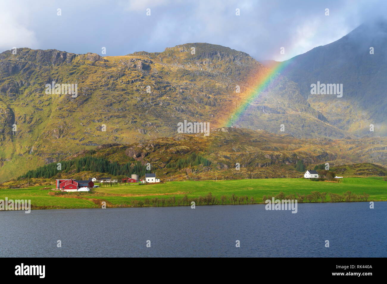 Rainbow above the coastal village of Leknes, Vestvagoy, Lofoten Islands, Norway Stock Photo