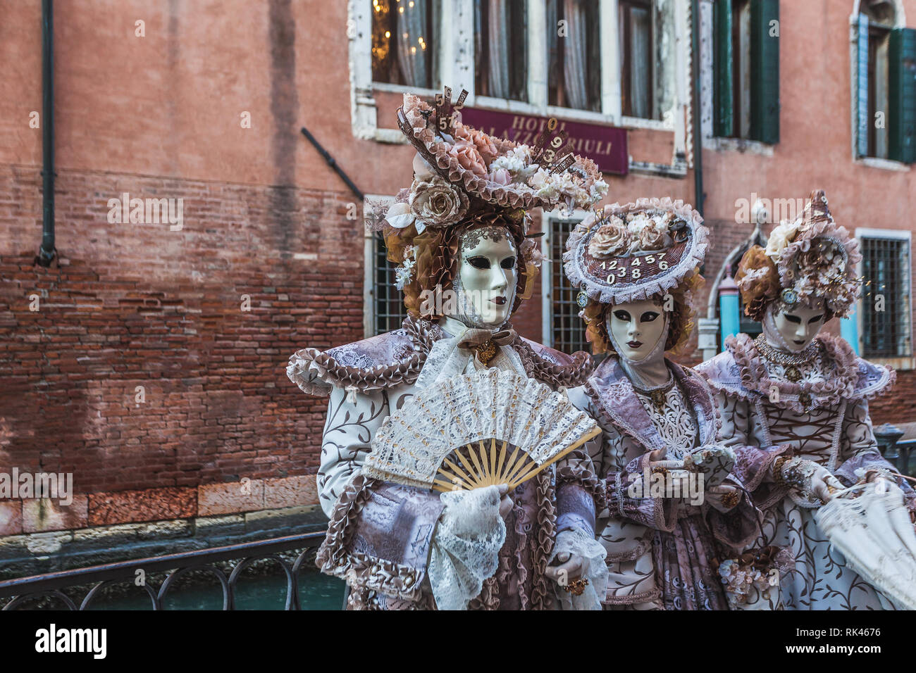 VENICE, ITALY - FEBRUARY 10 2018: Five hundred carnival masks posing for photographers Stock Photo
