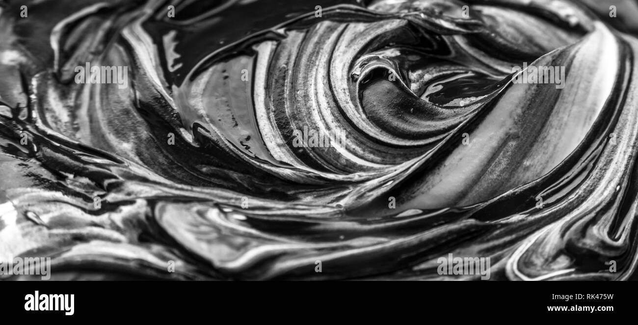 Abstract black and white artwork as a result of mixing paint Stock Photo Alamy