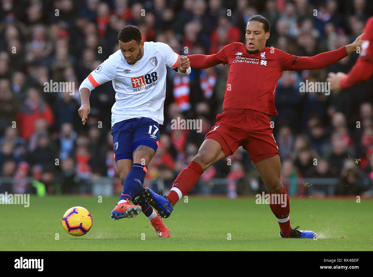 Bournemouth S Joshua King Left And Liverpool S Virgil Van Dijk Battle For The Ball During The Premier League Match At Anfield Liverpool Stock Photo Alamy