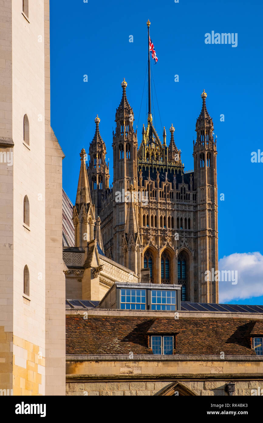 London, England / United Kingdom - 2019/01/28: Victoria Tower of the Houses of Parliament – Westminster Palace seen from the royal Westminster Abbey i Stock Photo