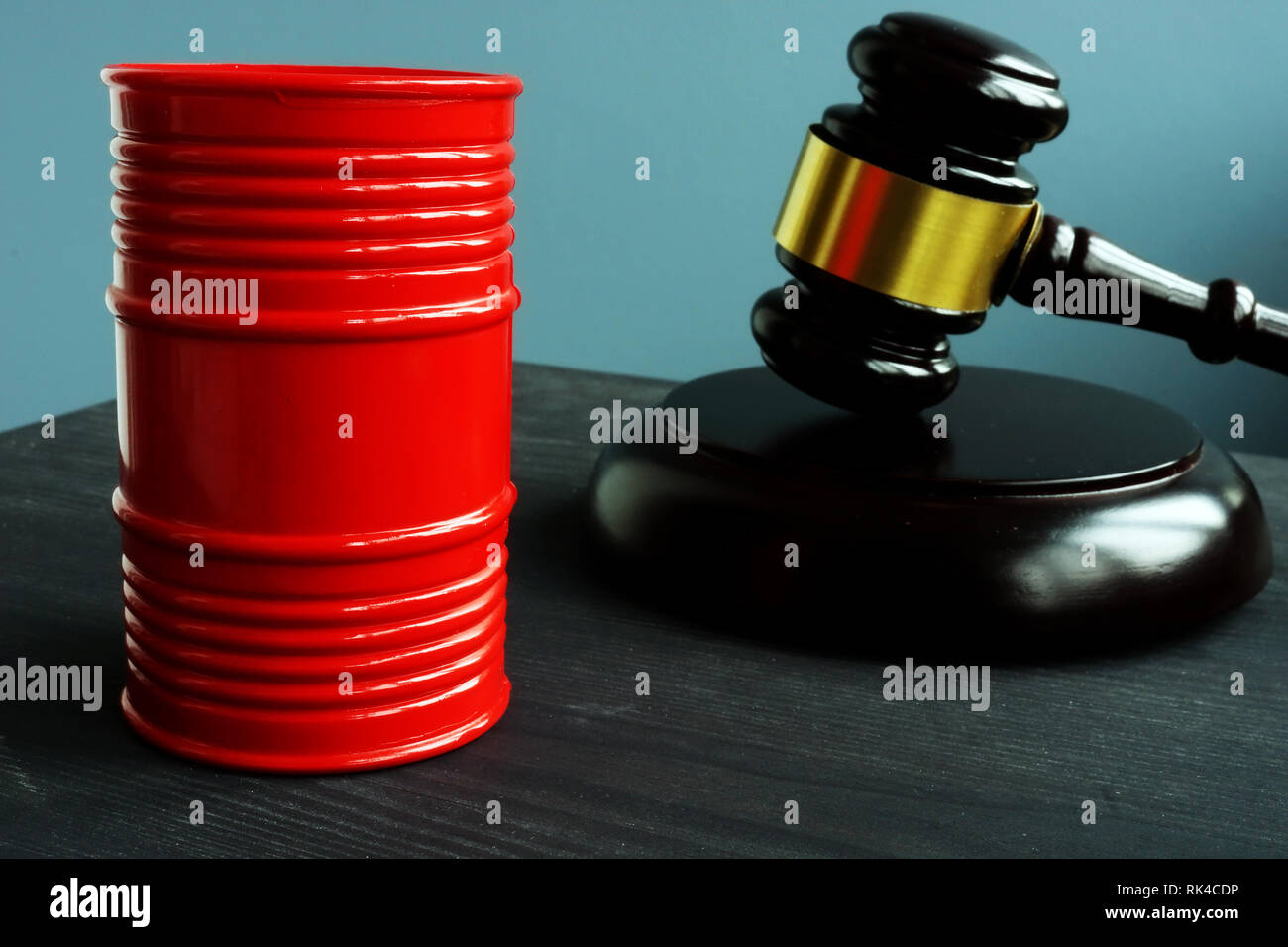 Sanction and regulation concept. Barrel of oil and gavel. Stock Photo