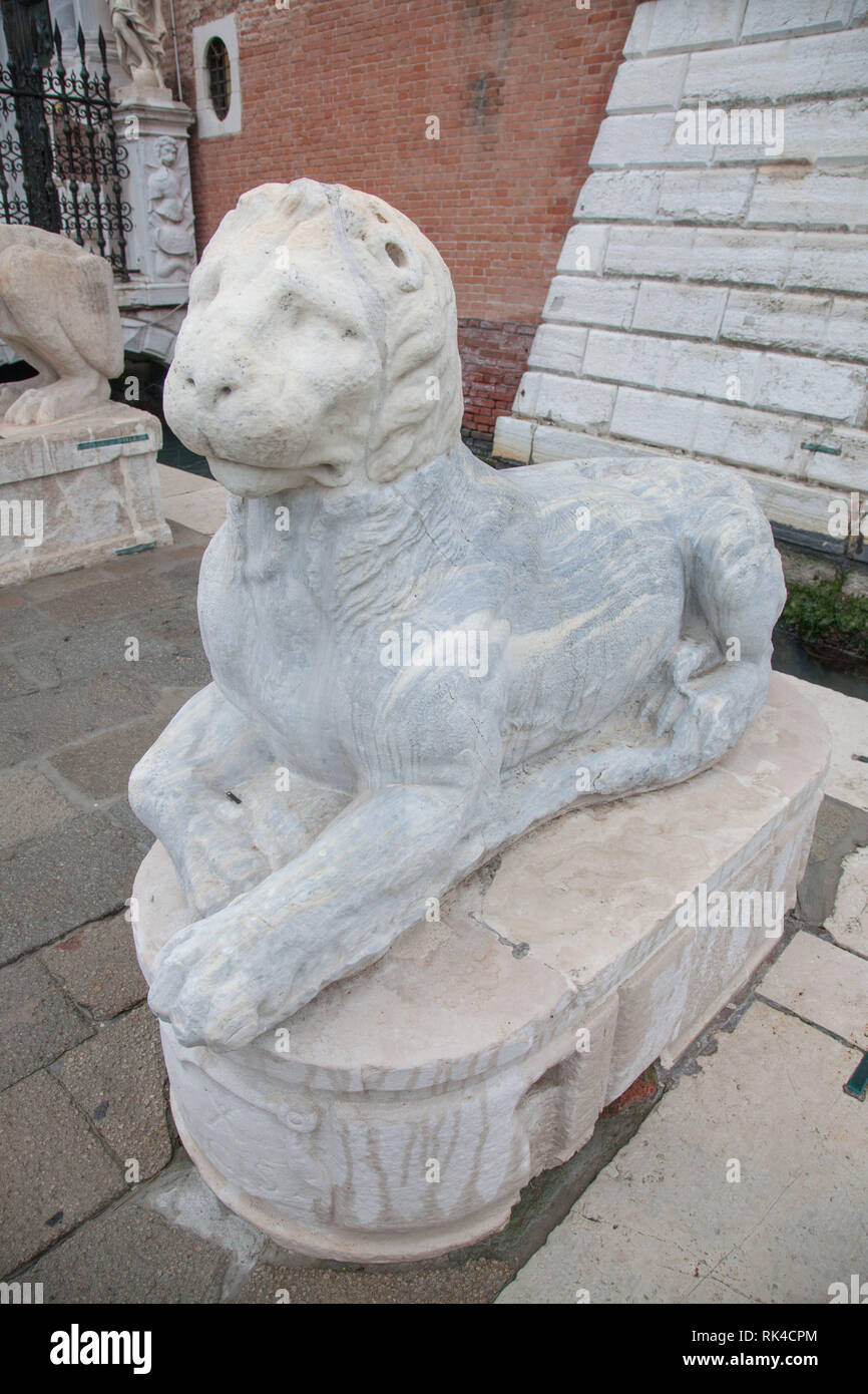 Old roman lion statues in the old city of Venice, Italy Stock Photo