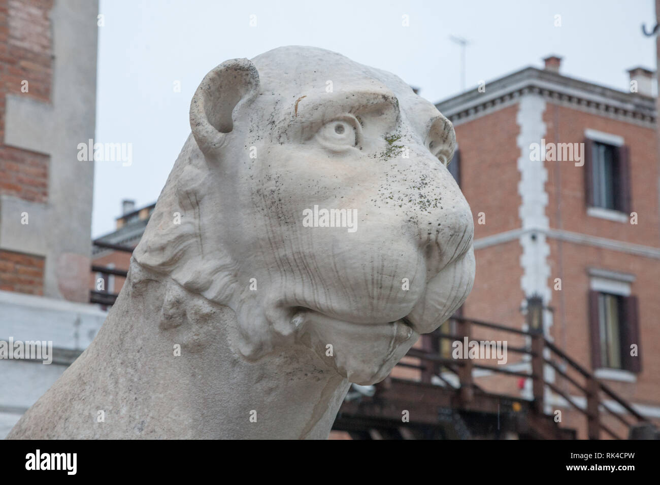 Old roman lion statues in the old city of Venice, Italy Stock Photo