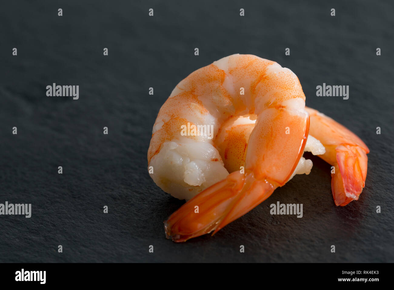 Farmed, cooked jumbo king prawns, Litopenaeus vannamei, bought from a supermarket in the UK and imported from the Far East. England UK GB. Photographe Stock Photo