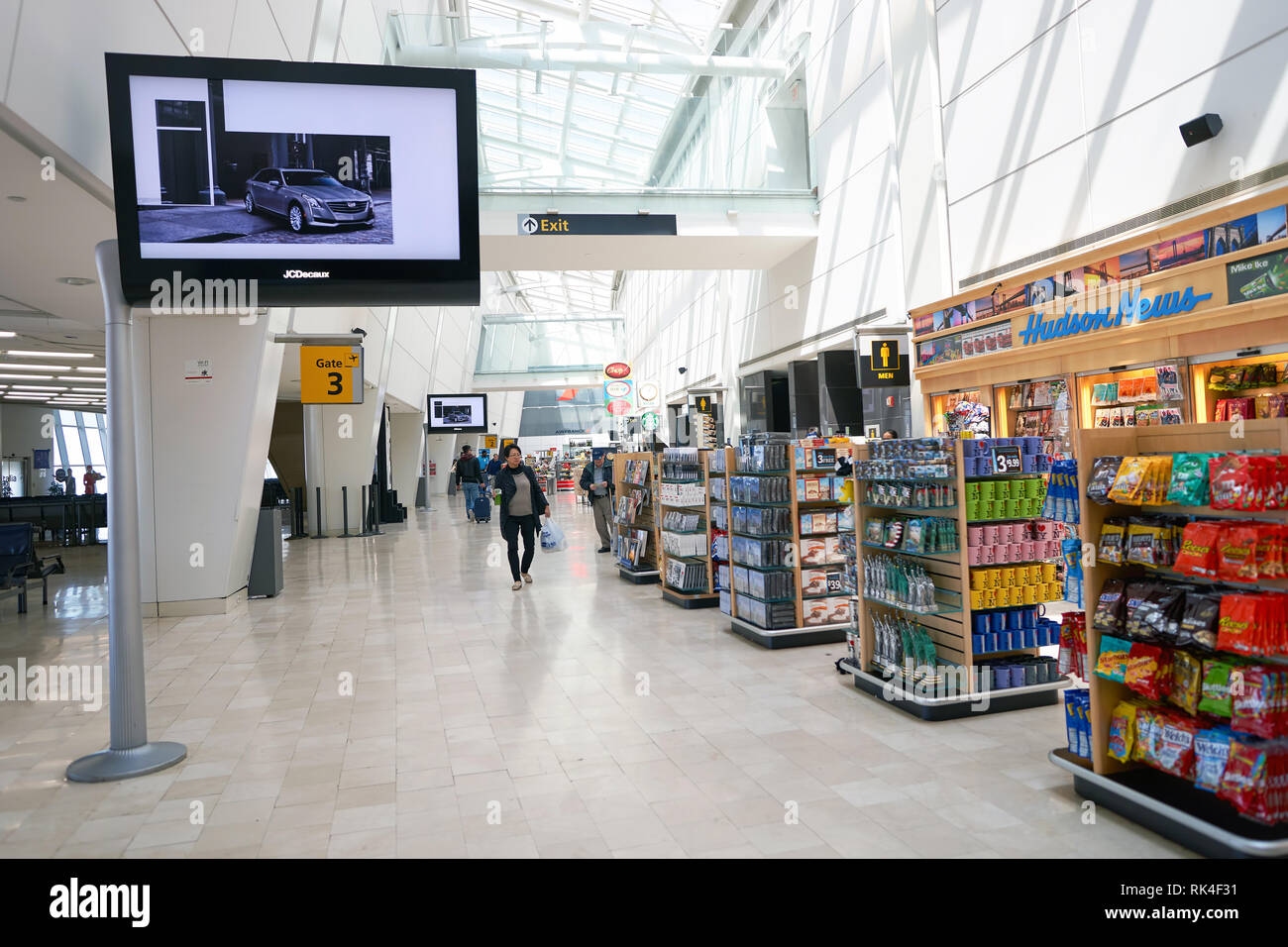 NEW YORK - APRIL 06, 2016: inside of JFK airport. John F. Kennedy International Airport is a major international airport located in Queens, New York C Stock Photo