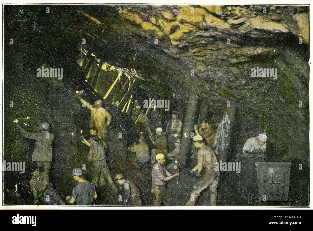 Coloured halftone of men working in a Cornish tin mine, early 1900s. Stock Photo