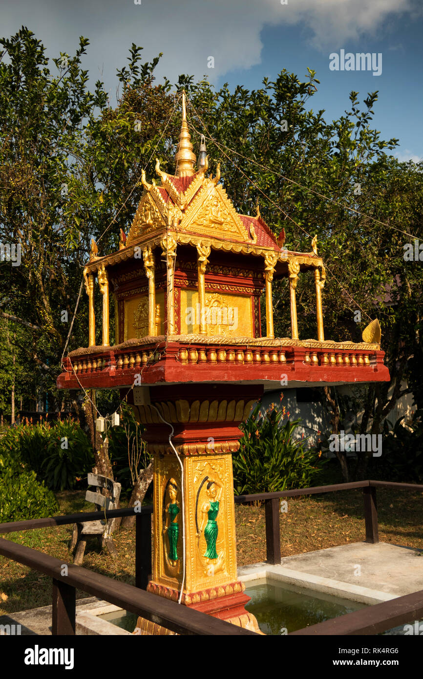 Cambodia, Koh Kong Province, Chi Phat, ornate gold painted Buddhist spirit house outside village