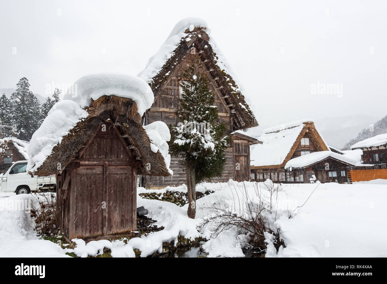 Shirakawago village with snow fall in winter season . Landmark of Gifu , Takayama , Japan . Stock Photo