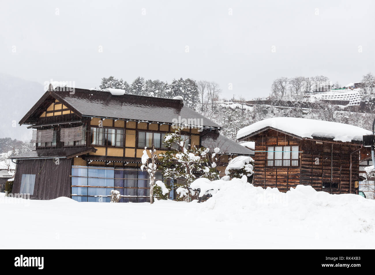 Shirakawago village with snow fall in winter season . Landmark of Gifu , Takayama , Japan . Stock Photo
