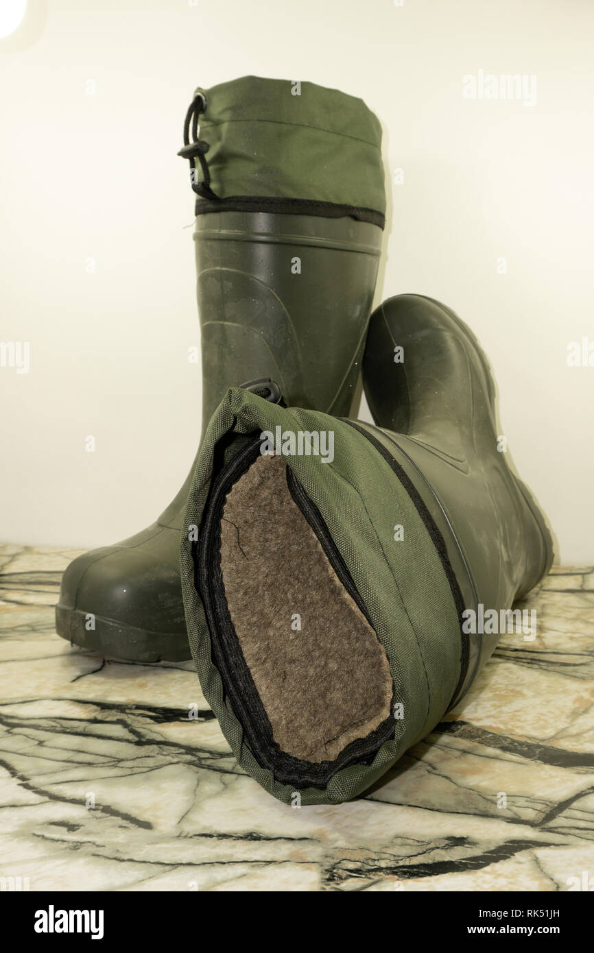 old rubber men's boots, inside insulated with fur. isolated on white  background Stock Photo - Alamy