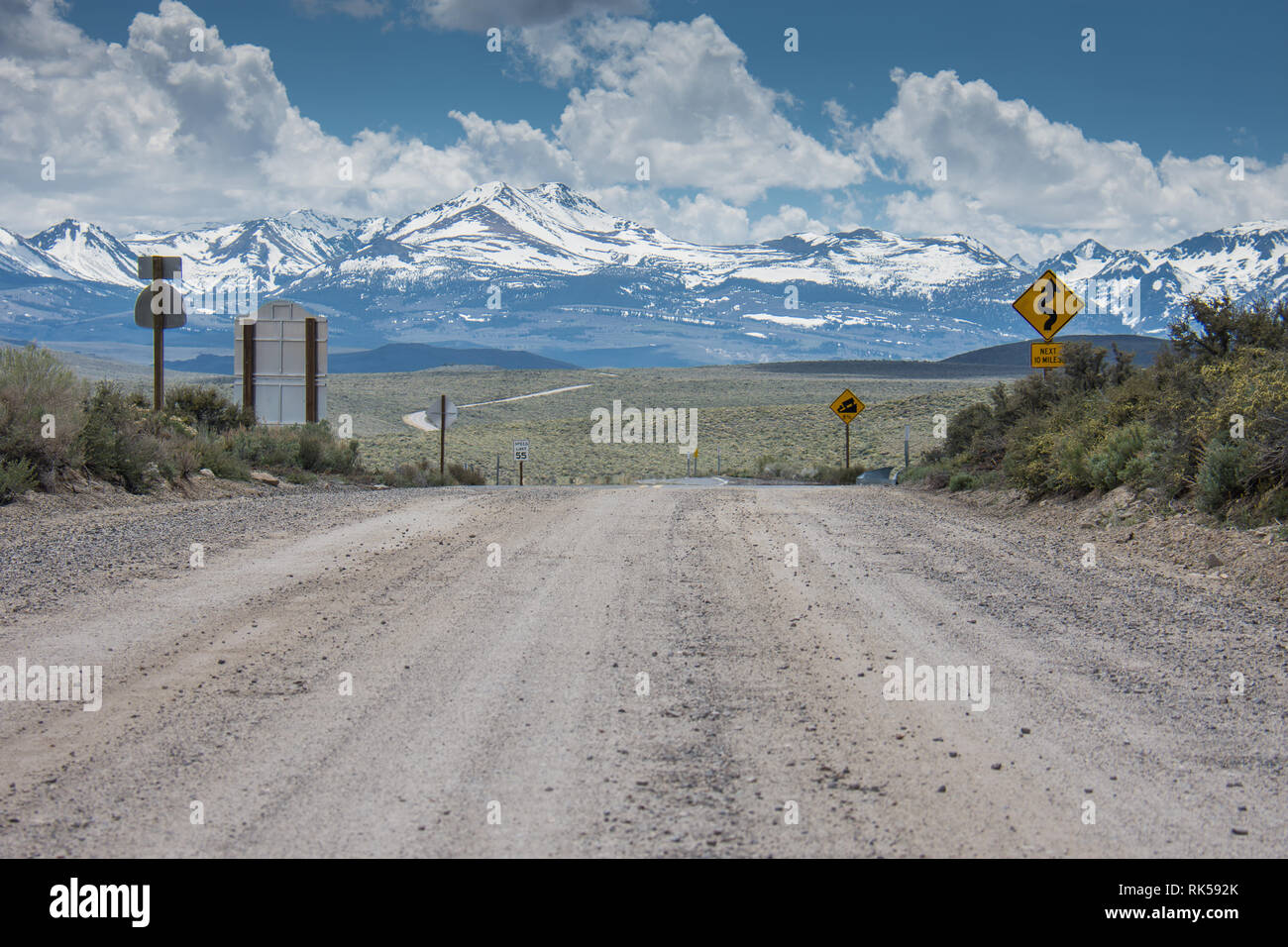 The pavement ends and the dirt road begins on California State Highway 270  near Bodie Ghost Town in the Eastern Sierra Nevada Mountains Stock Photo -  Alamy