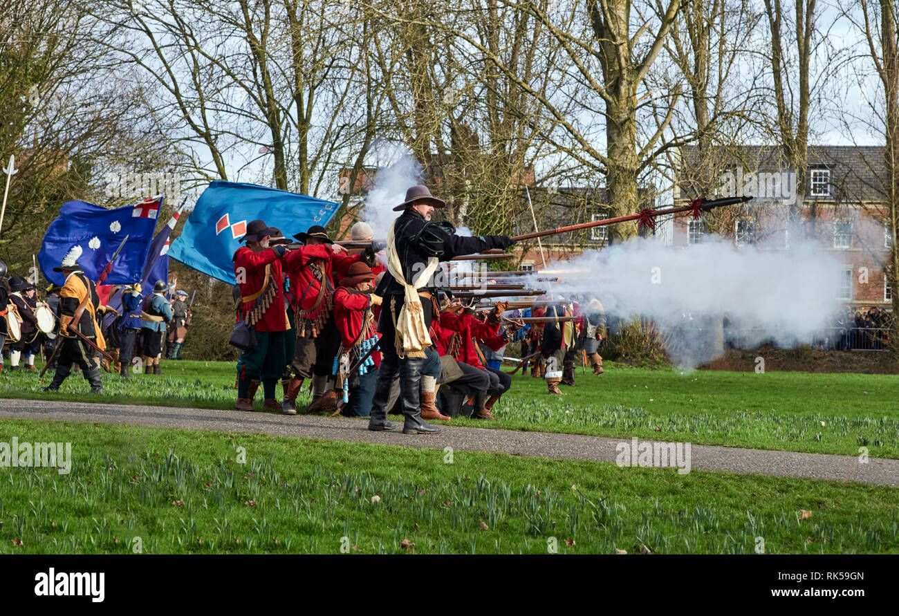 Members of the Sealed Knot re-enactment society fire a volley of muskets at the 2019 battle of Nantwich Stock Photo