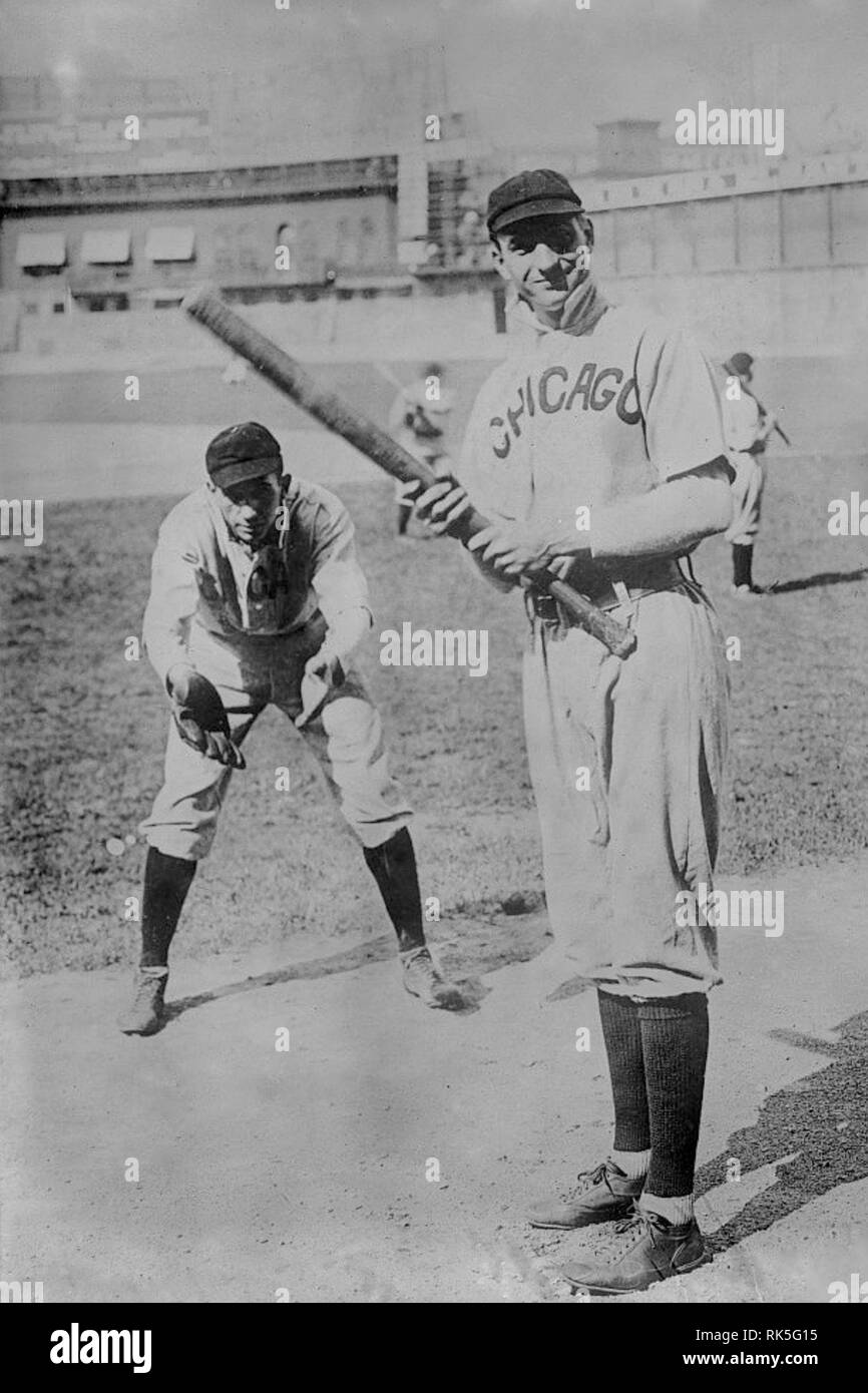 Arther Solly Hofman batting, and Jack Pfiester, a pitcher, playing catcher, Chicago Cubs 1907. Stock Photo