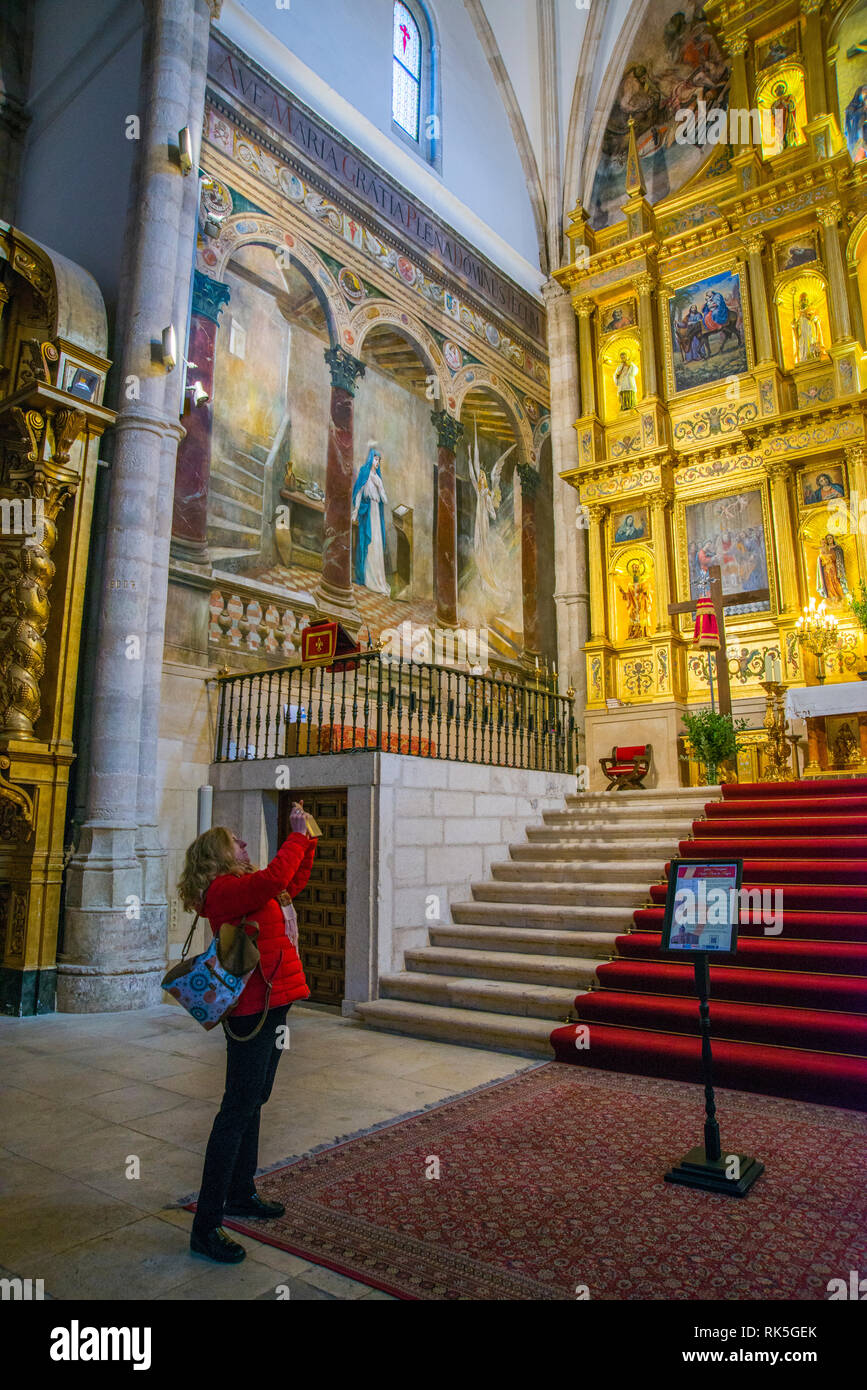 Tourist taking photos in the church. Colmenar de Oreja, Madrid province, Spain. Stock Photo