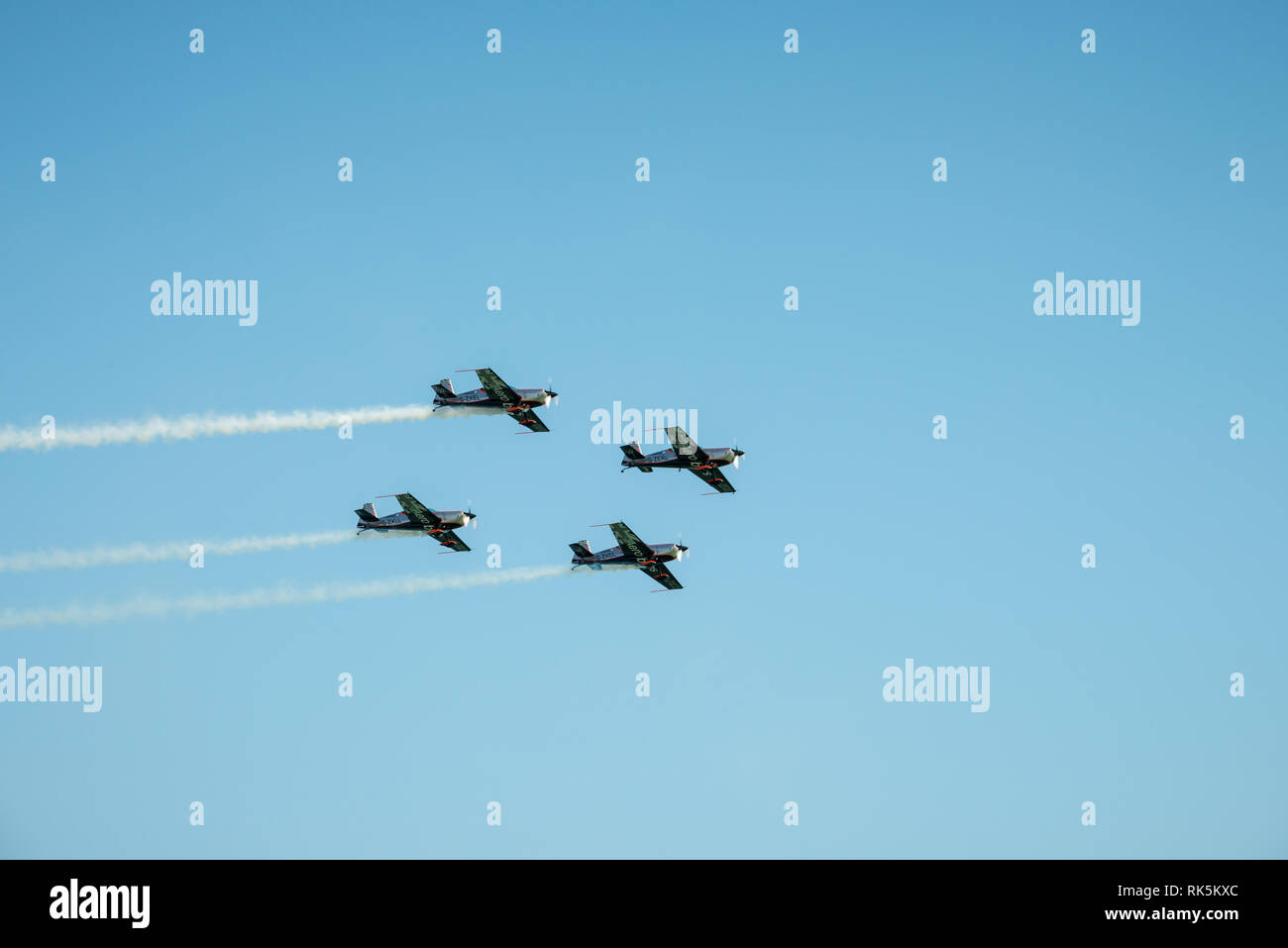 Four aircraft fly close together as they perform a stunt during the Eastbourne Airshow in Sussex, England. Stock Photo