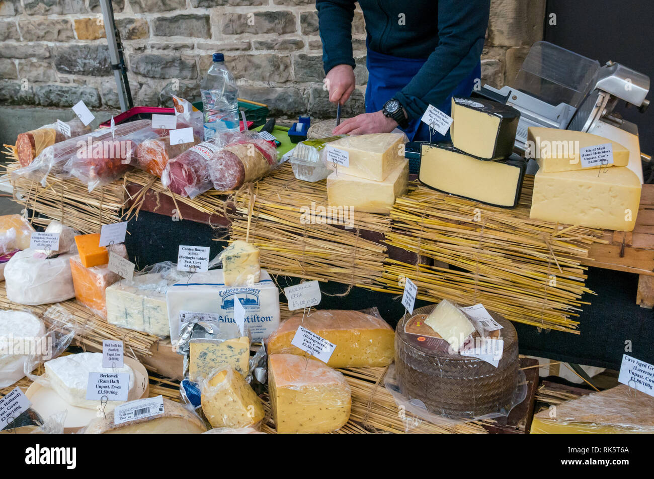 Artisan cheese stall, cheeses on display, Leith Saturday market, Dock Place, Edinburgh, Scotland, UK Stock Photo