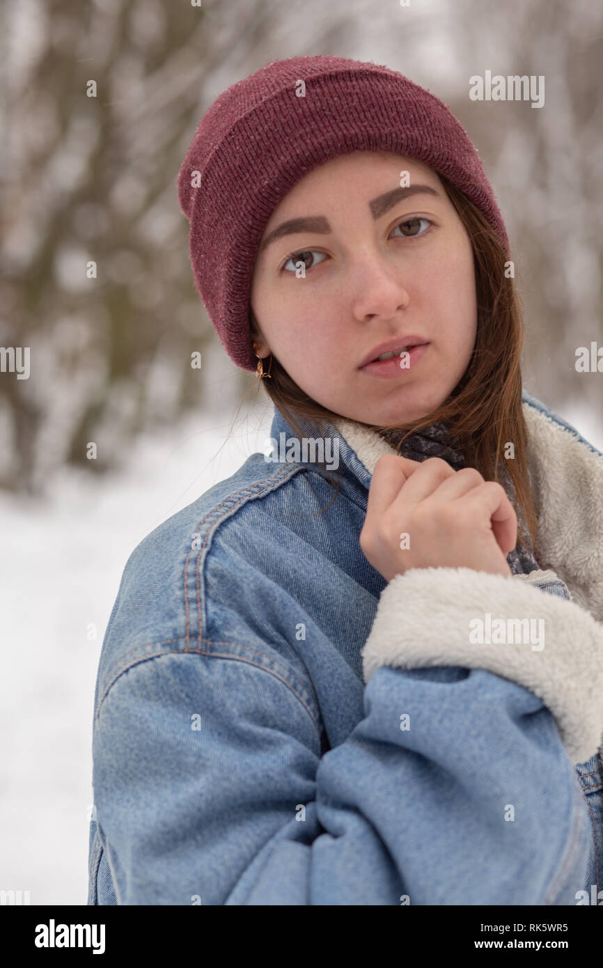 beautiful sad woman relax on winter forest Stock Photo - Alamy