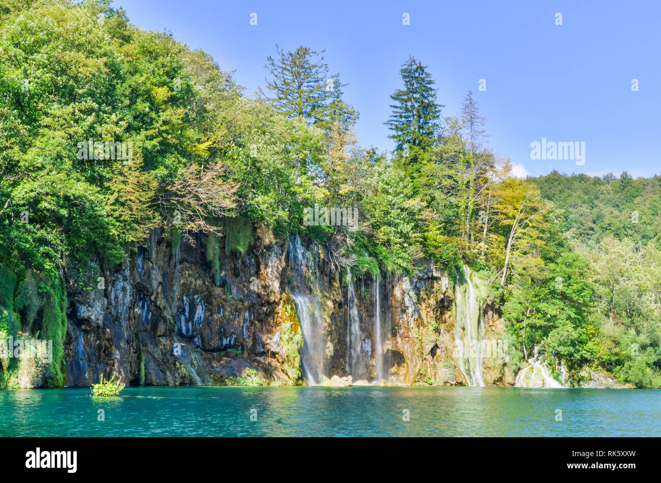 Stunning nature of the Plitvice Lakes National Park (UNESCO World Heritage Centre) in Croatia: waterfalls, wildlife, bridges, tourists ... Stock Photo
