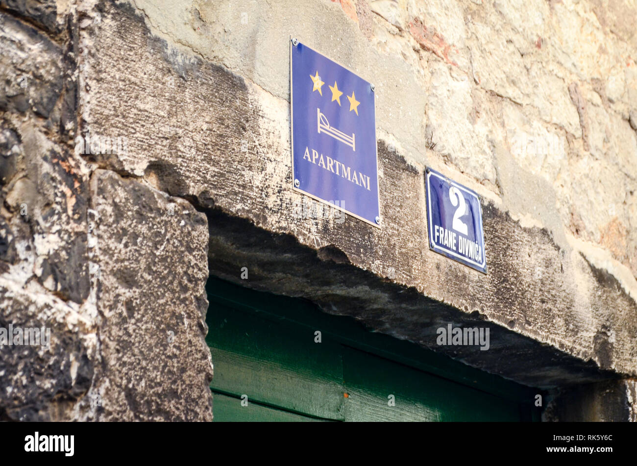 APARTMANI sign in the old town of Sibenic, Croatia Stock Photo