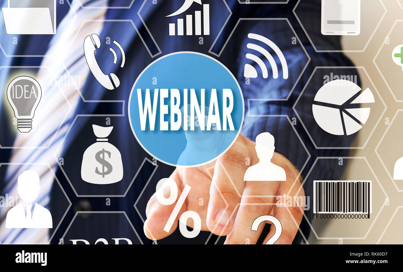 The businessman clicks WEBINAR button on the touch screen Stock Photo