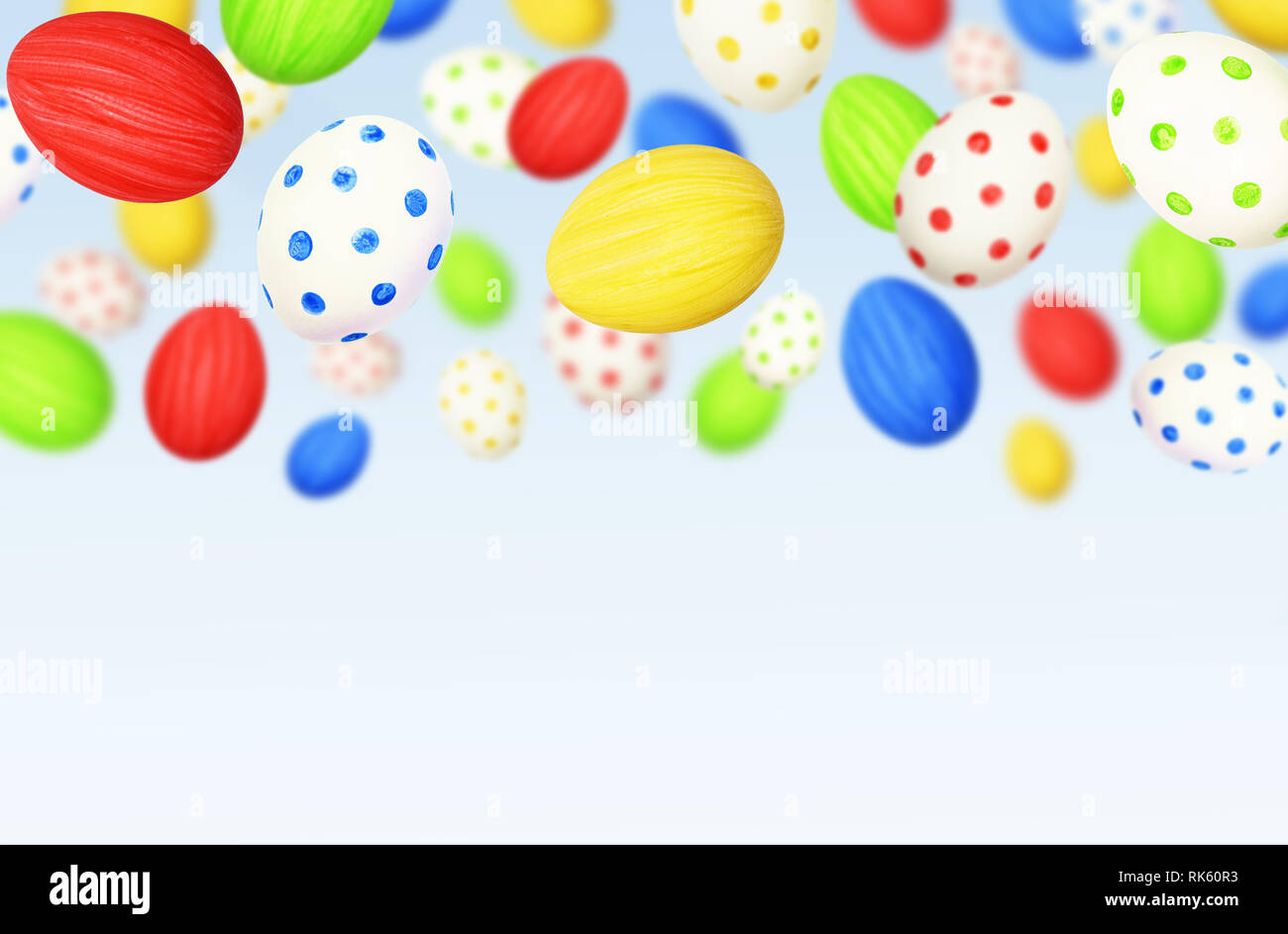 Cololrful Easter eggs on blue sky background Stock Photo