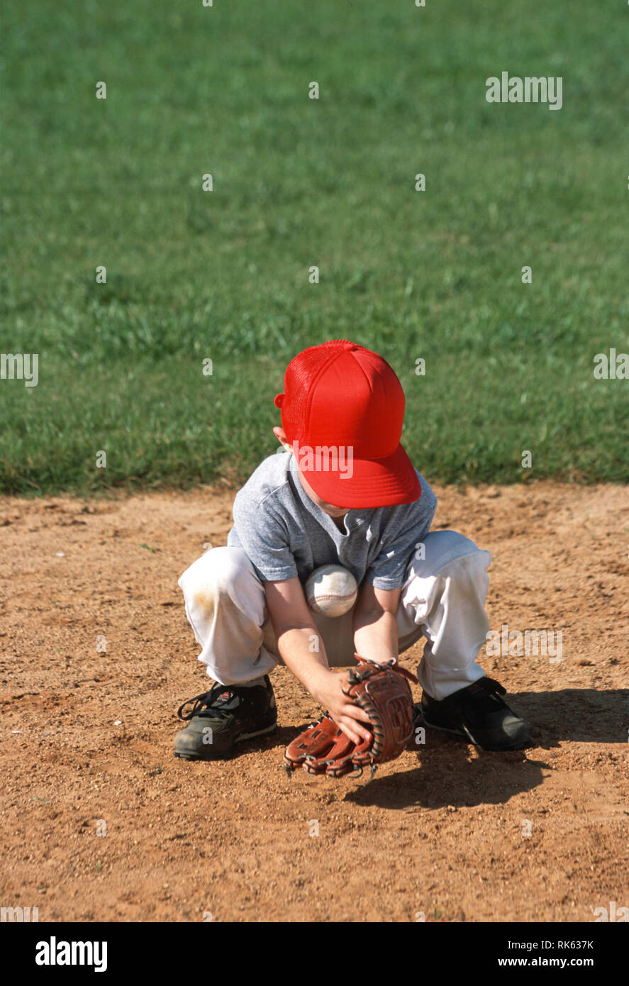 Boy catching ball baseball hires stock photography and images Alamy