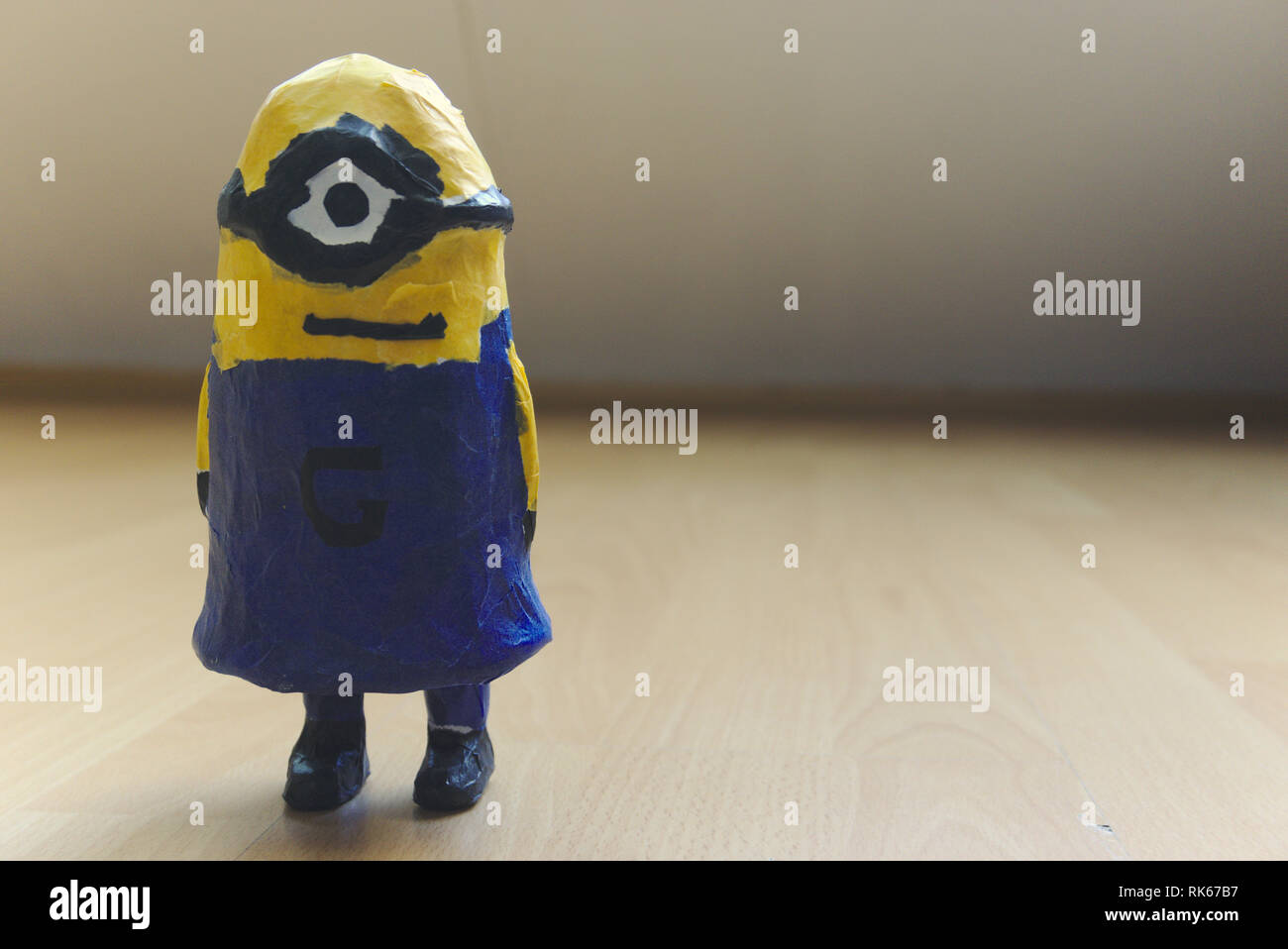 diy selfmade minion with one eye and black goggle. blue jeans. despicable me. Stock Photo