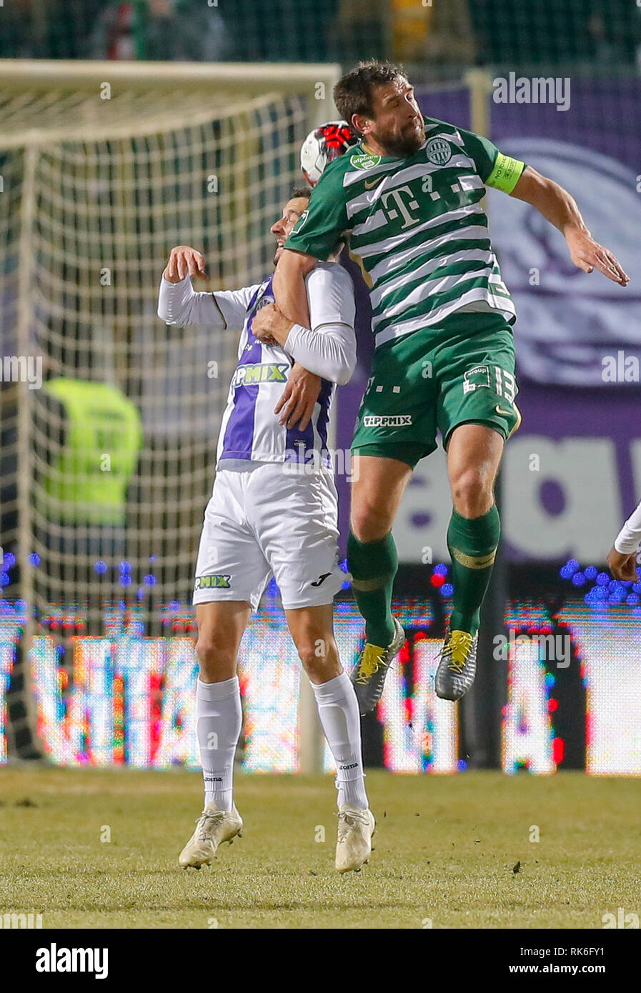 BUDAPEST, HUNGARY - MAY 27: (r-l) Endre Botka of Ferencvarosi TC challenges  Krisztian Simon of Ujpest FC during the Hungarian OTP Bank Liga match  between Ujpest FC and Ferencvarosi TC at Ferenc