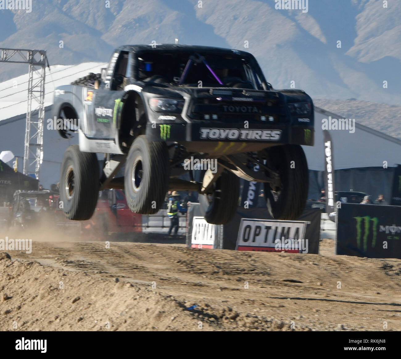 Rocking-across-desert-with-Baldwin,-Monster-Energy-truck