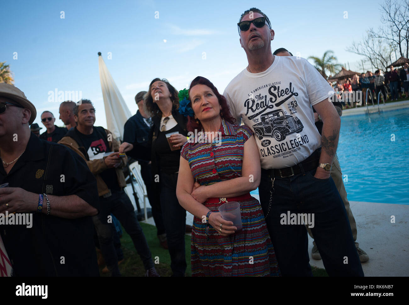 Malaga, Spain. 9th Feb 2019. A couple dressed in vintage clothes attend a concert outside the hotel during the Rockin Race Jamboree Festival. Thousands of people from around the world gather every year during The Rockin' Race Jamboree International Festival for four days in Torremolinos, a meeting place for all lovers of rockabilly and swing music. Credit: SOPA Images Limited/Alamy Live News Stock Photo