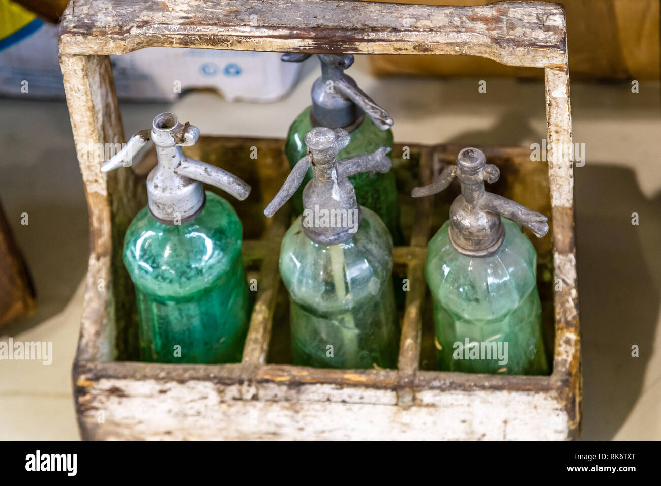 CESENA, ITALY - JANUARY 20, 2019: lights are enlightening seltzer bottles  for sale in Antiques Fair Stock Photo