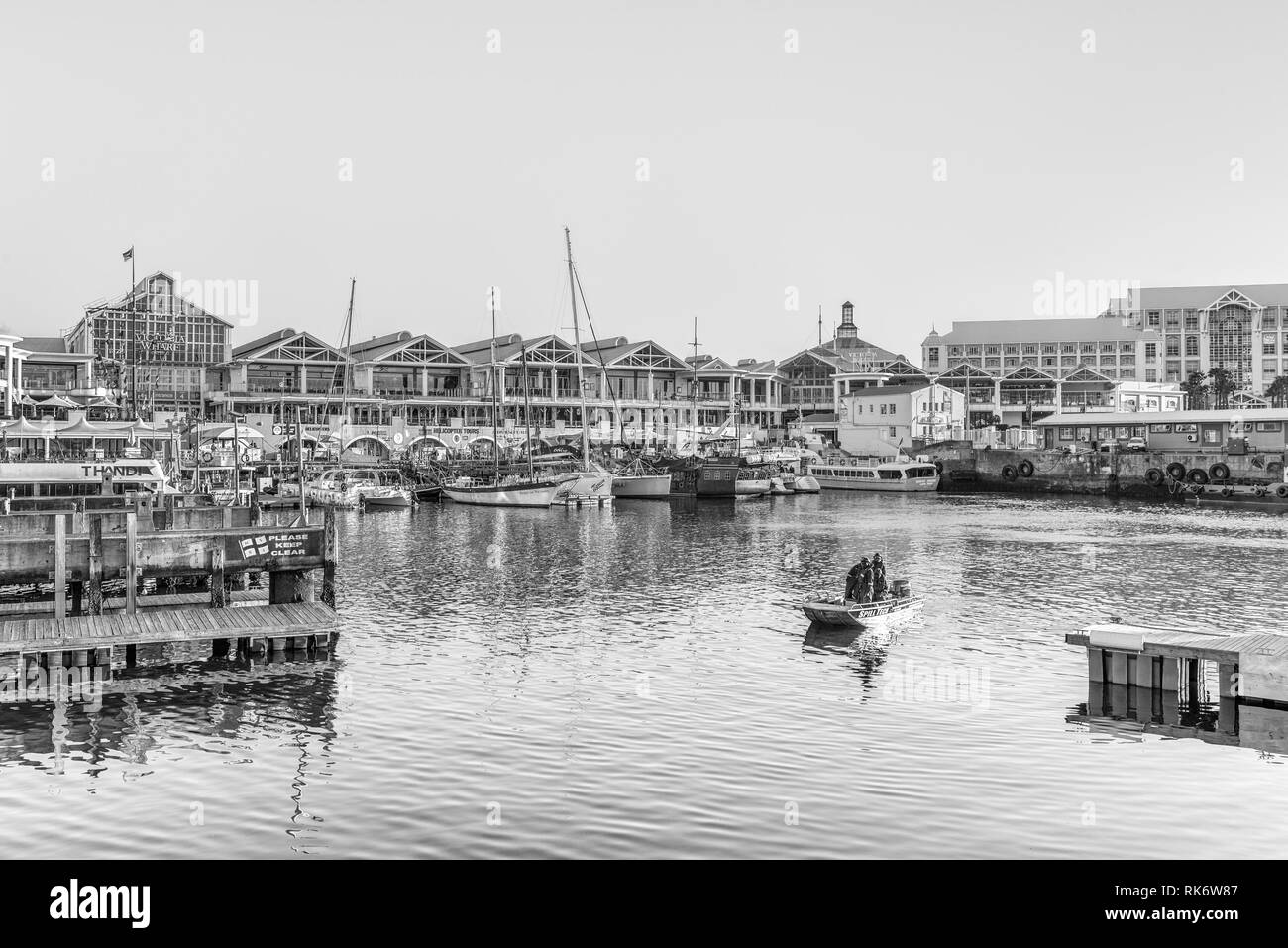 CAPE TOWN, SOUTH AFRICA, AUGUST 9, 2018: Monochrome view of the harbor and the Victoria and Alfred Waterfront in Cape Town in the Western Cape Provinc Stock Photo
