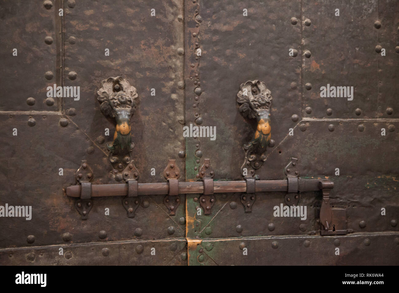 Old hadles and lock on the door of the Sint Pieter Basilica in Rome Stock Photo
